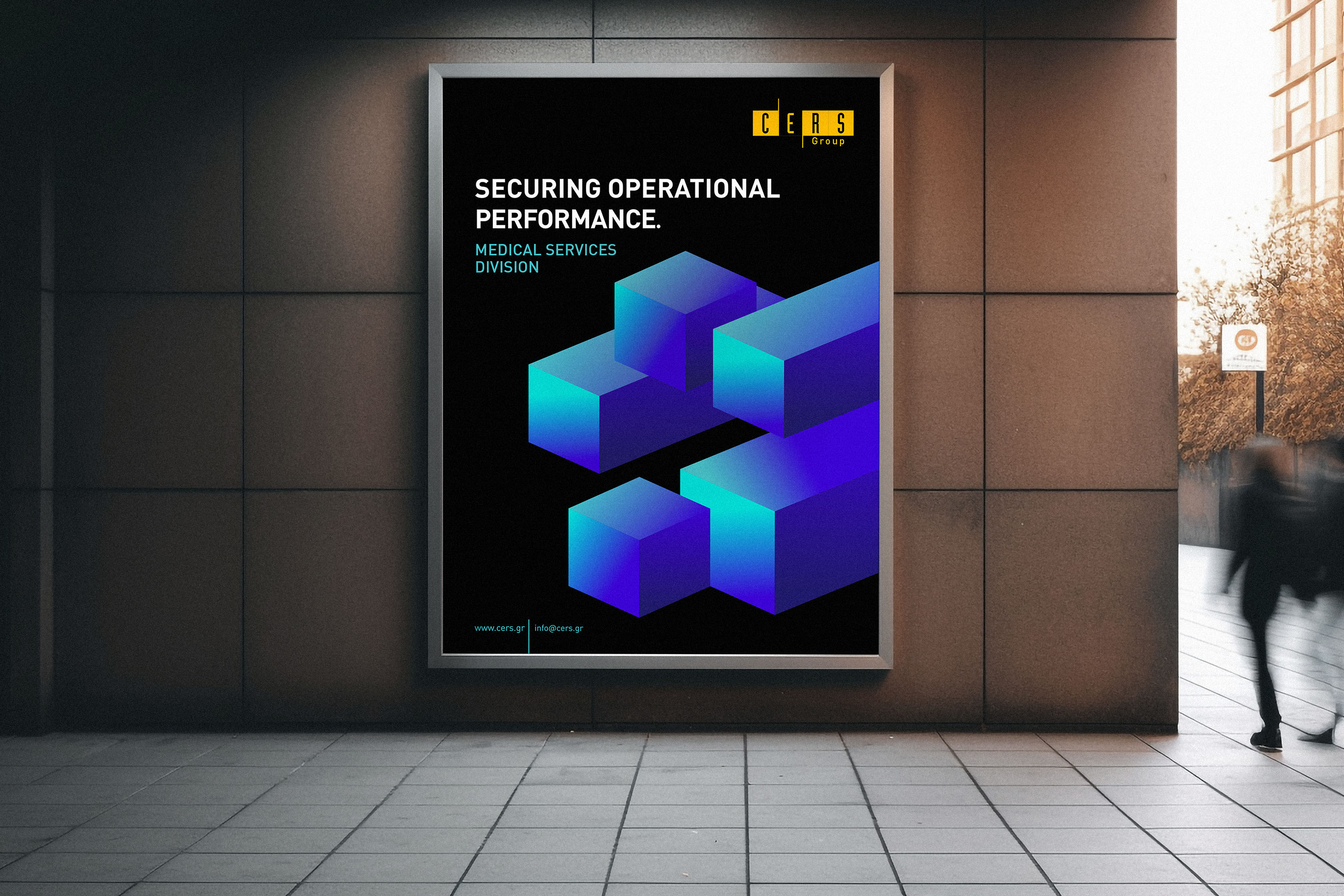 A billboard on a building’s wall promotes CERS services in the Medical Division.