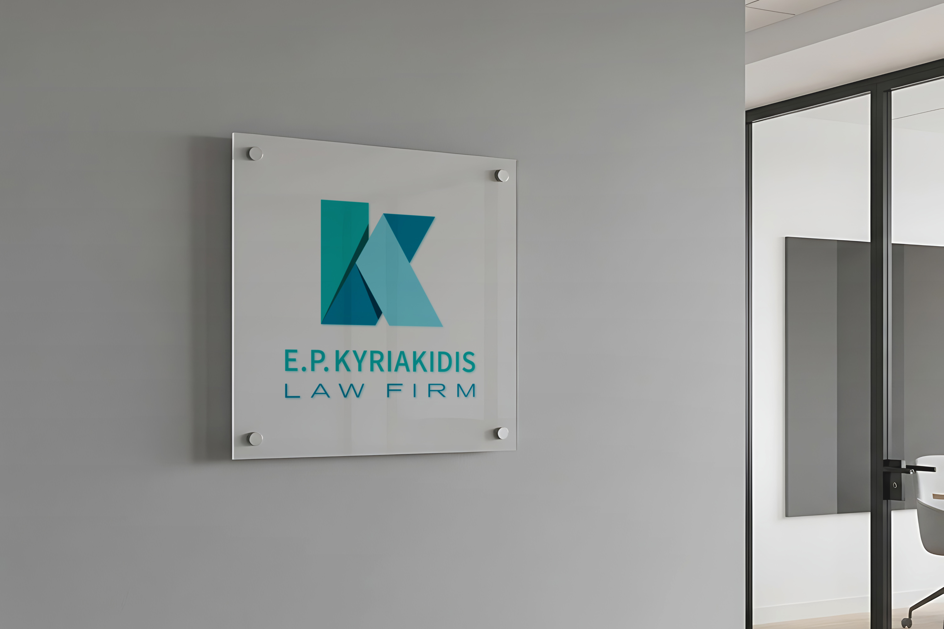 Kyriakidis Law wall sign outside of the office.