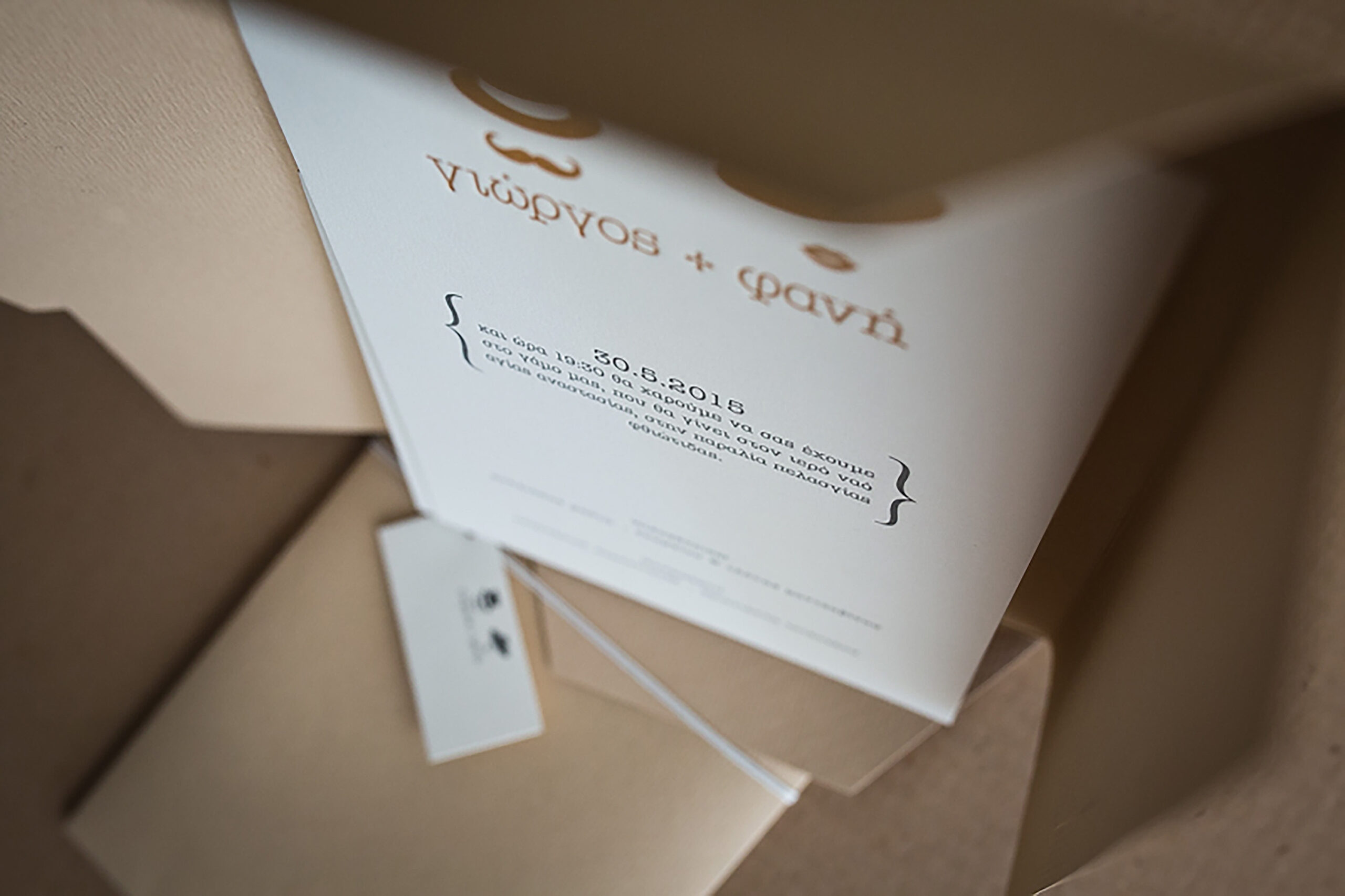Wedding Letterpress typograhy invitation with custom craft envelope and paper tag hanger.