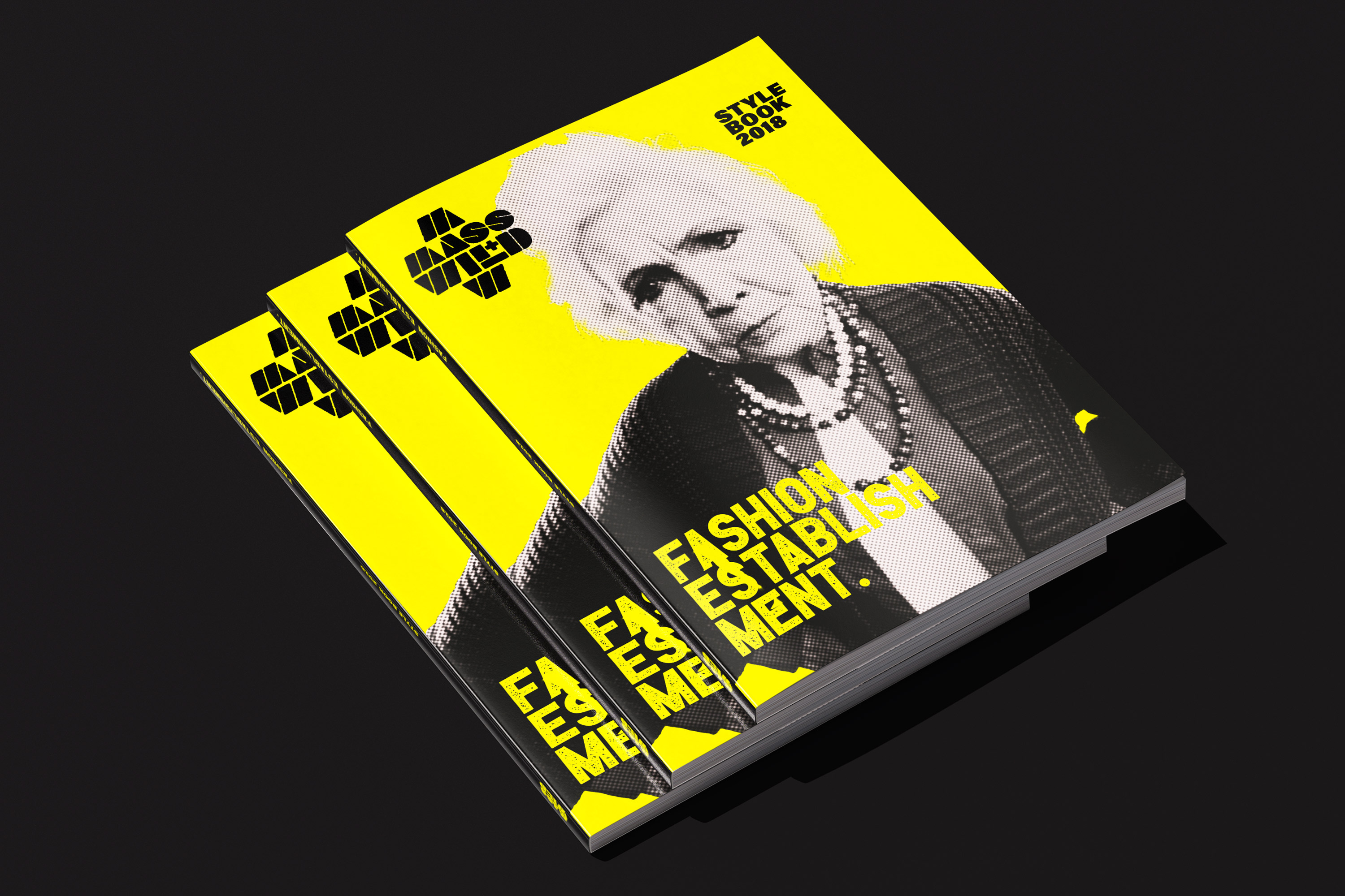 A Stack of Mass+Wilde Style book 2018. The cover features Miss Beatrice, the 78-year-old owner of the building that houses the Mass+Wild store.