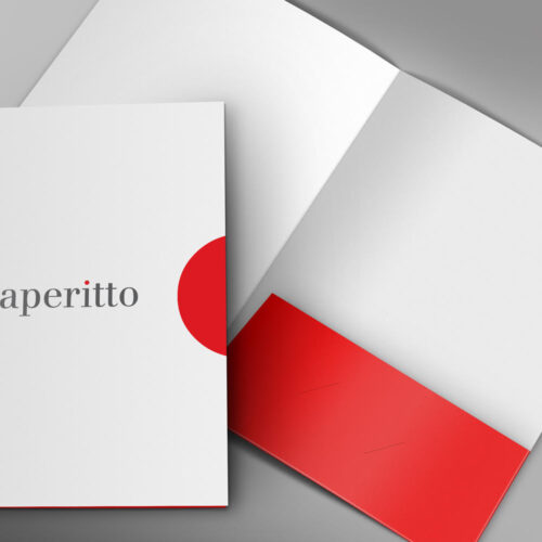 Aperitto folder design. The folder is printed on 400g paper with a matt UV finish and a spot UV on the logo.