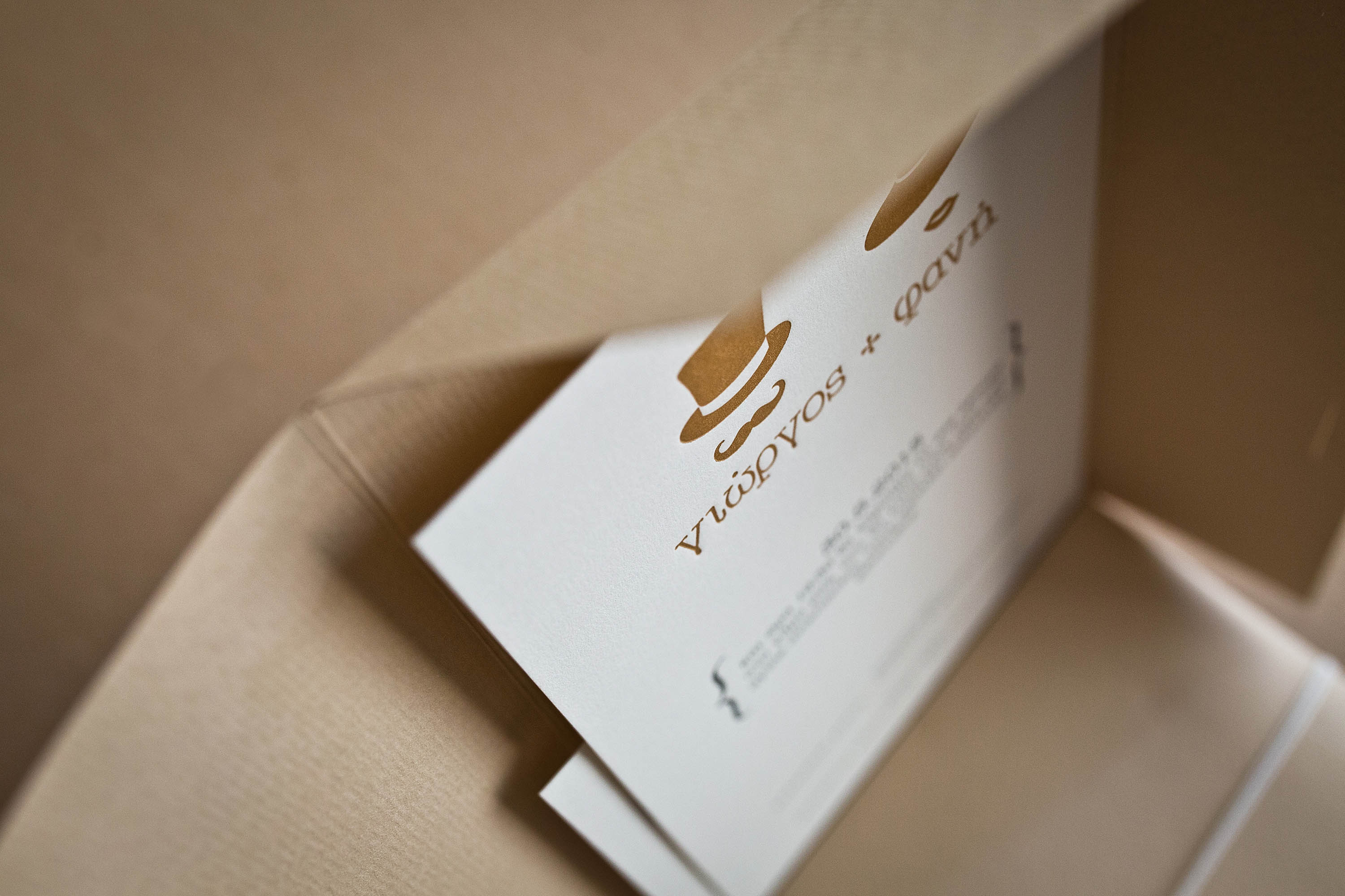 Wedding Letterpress typograhy invitation with custom craft envelope and paper tag hanger.