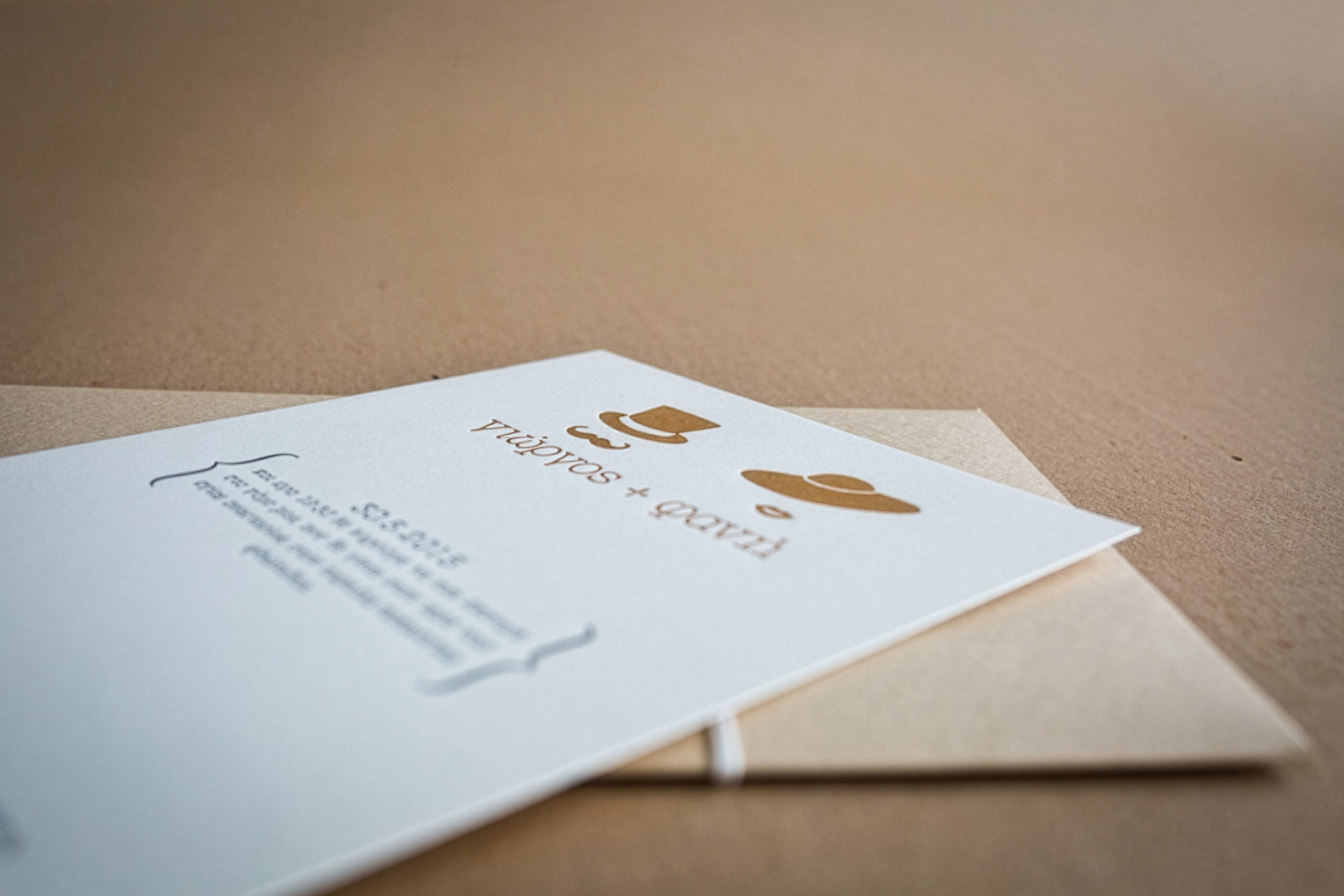 Wedding Letterpress typograhy invitation with custom craft envelope and paper tag hanger.